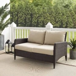 Kiawah Outdoor Wicker Loveseat Beige - Crosley -Crosley Sales Store GUEST 9fb8fd04 bcc0 4d69 9f29 fe9264050a41